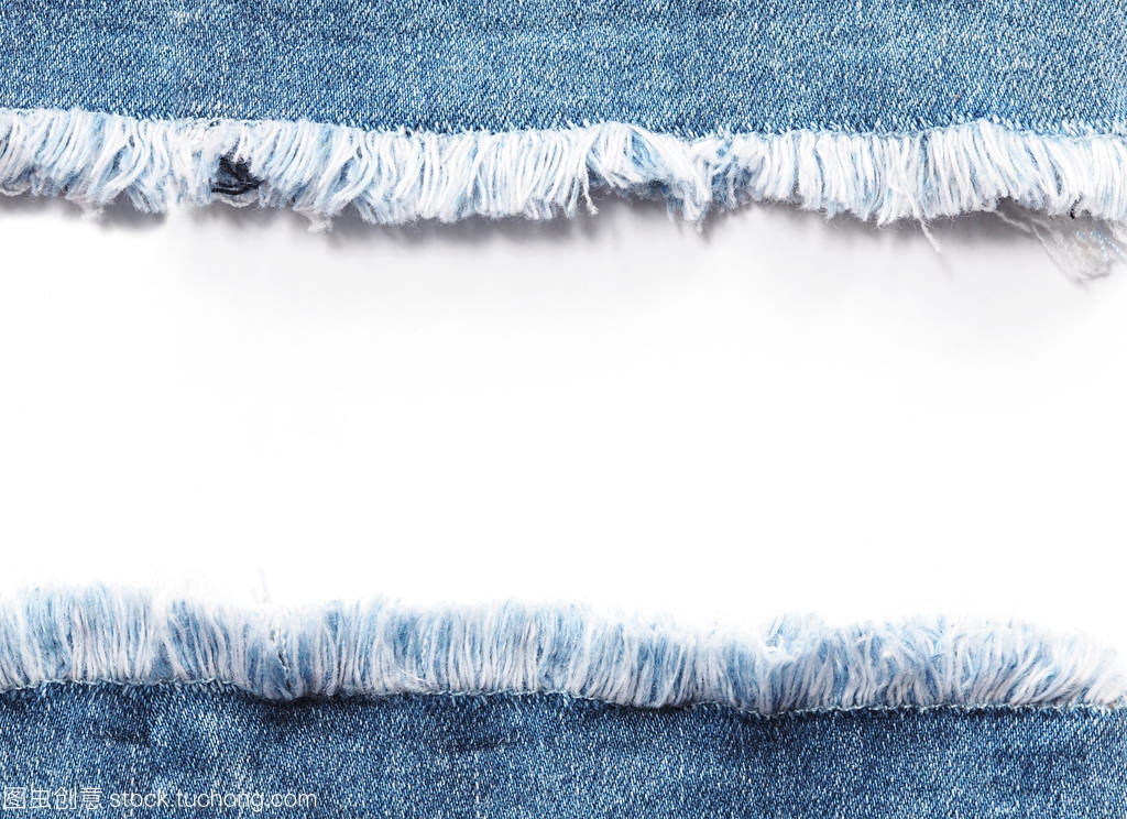 粗獷的時尚 邊緣幀下的藍色斜紋牛仔褲